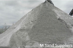 Crusher dust supplied for filling, levelling, and site preparation in Bangalore.